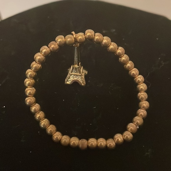 6” golden beaded stackable stretch bracelet with Eiffel Tower pendant & 39 beads - Picture 4 of 11